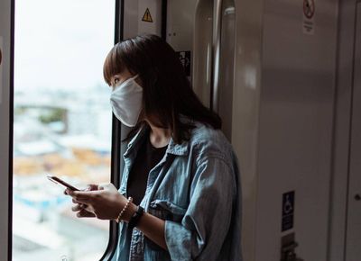 woman by train window